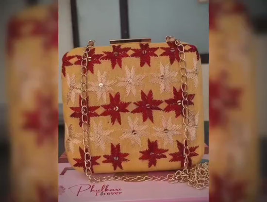 Pure Silk Hand Embroidered Phulkari Clutch - golden yellow + Artisanal + Punjab + Tradition + Women + MakeInIndia + Handicraft + red golden Motif + trend + festival wear + comfort wear + smart wear + trendy wear + indian ethnic + cultural wear + rakhi + diwali + ganesh cahturthi + friends wear + date wear + casual wear + indian wear + western wear + trendy attire + fashion + stylish + dinner + clutch + handbag + sling bag + classy + marriage essentials + bride wear + punjab + panjab + handwork